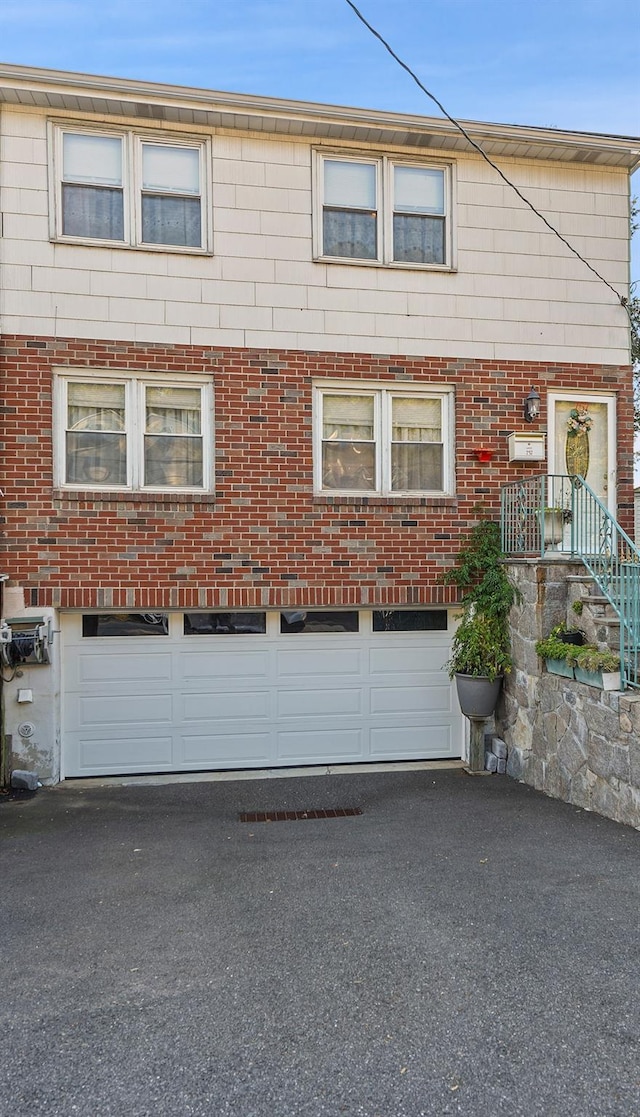 view of front of home featuring a garage