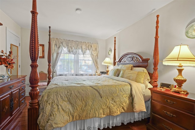 bedroom featuring dark hardwood / wood-style floors