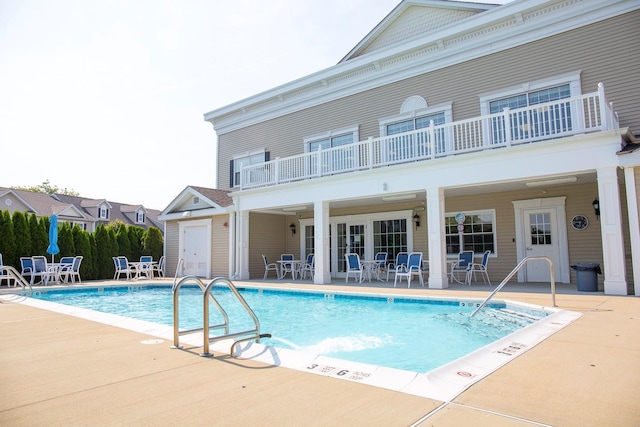 view of pool featuring a patio