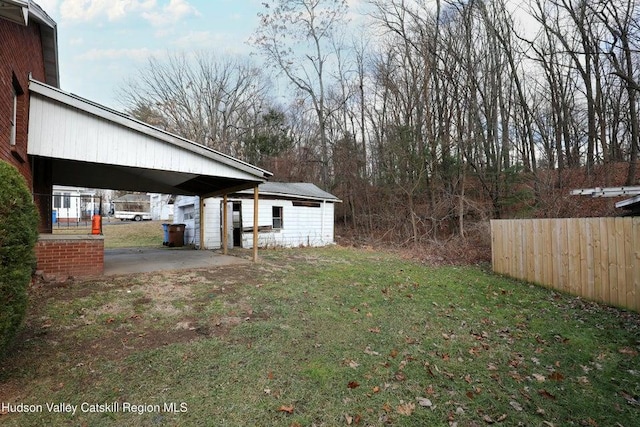 view of yard with a carport