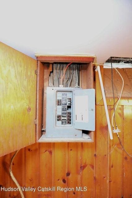 utility room featuring electric panel