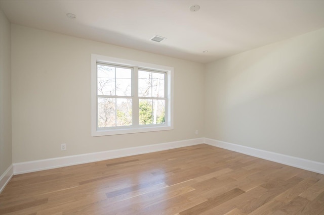 empty room featuring light hardwood / wood-style floors