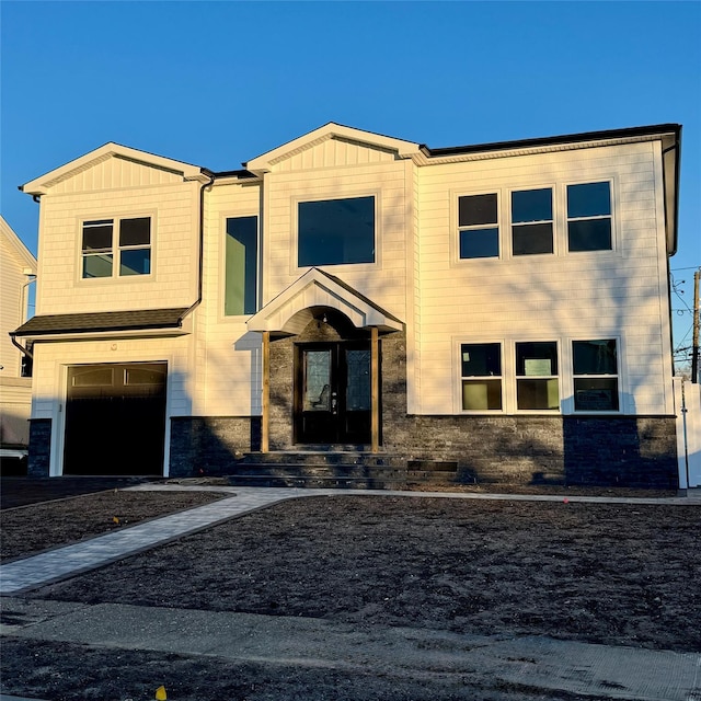 view of front of property with a garage