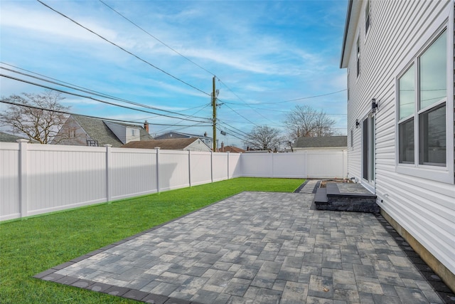 view of patio featuring a fenced backyard