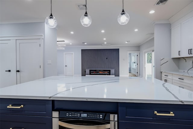 kitchen with recessed lighting, visible vents, white cabinets, open floor plan, and ornamental molding