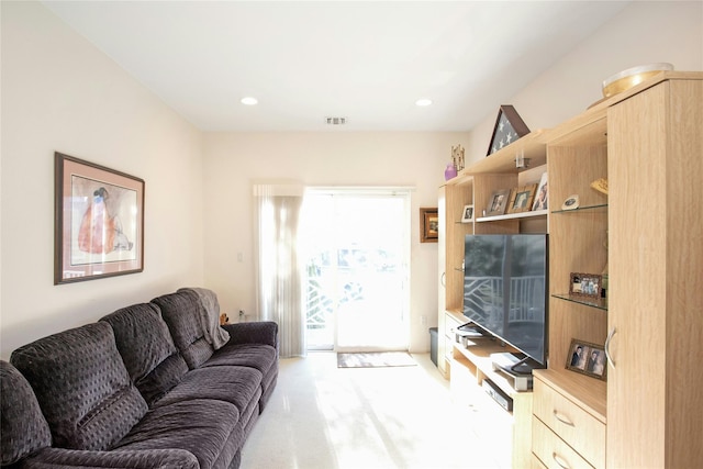 living room featuring light colored carpet