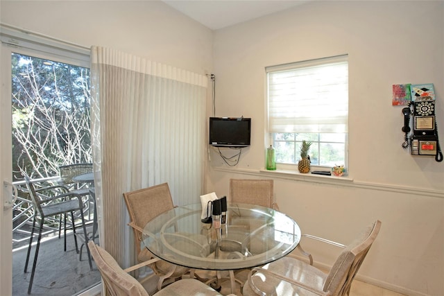 dining area with plenty of natural light