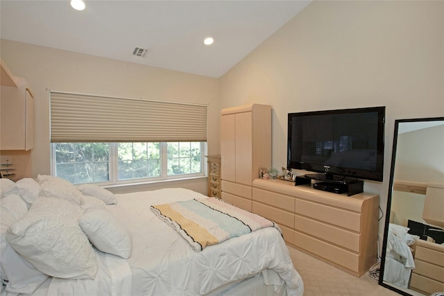 bedroom featuring lofted ceiling