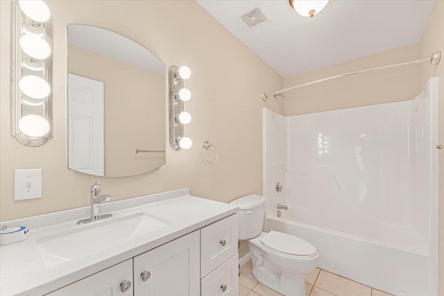 full bathroom with tile patterned floors, vanity, toilet, and tub / shower combination