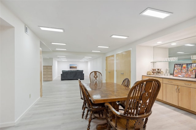 dining area featuring light hardwood / wood-style flooring