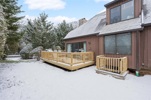 view of snow covered deck