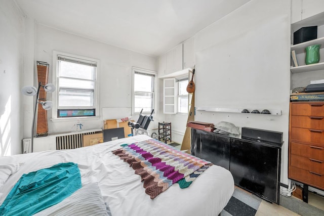 bedroom featuring radiator heating unit