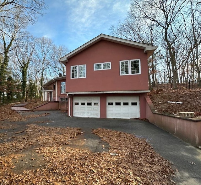 view of home's exterior with a garage