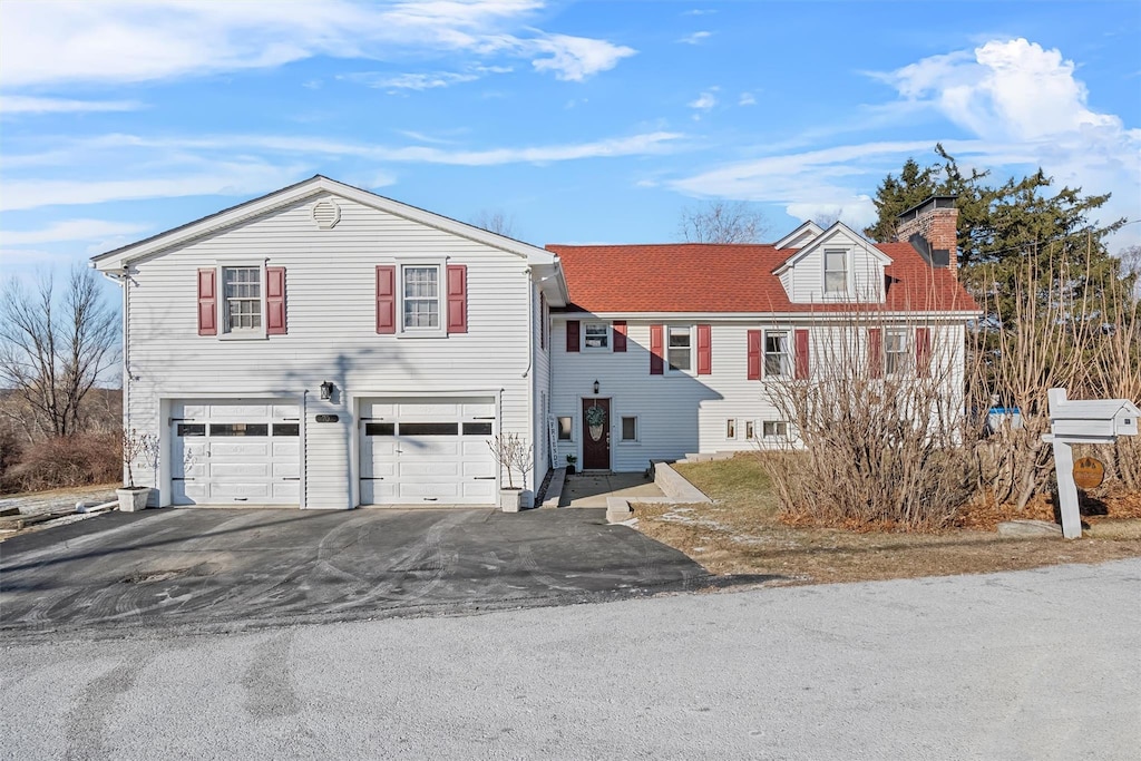 view of front of property featuring a garage