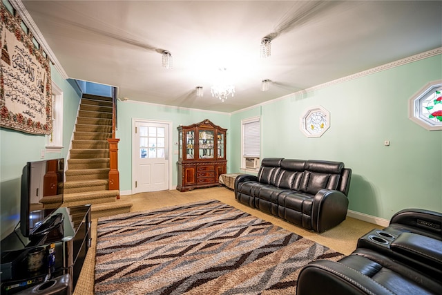 living room featuring carpet, a chandelier, and ornamental molding