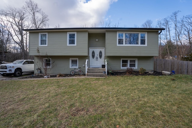 bi-level home with a front yard