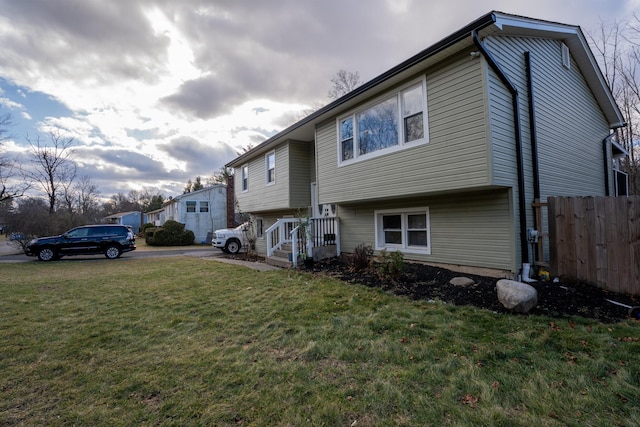 view of property exterior featuring a yard