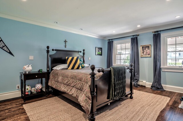 bedroom featuring dark hardwood / wood-style floors and ornamental molding