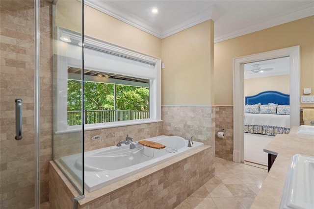 bathroom featuring tile patterned flooring, crown molding, and shower with separate bathtub