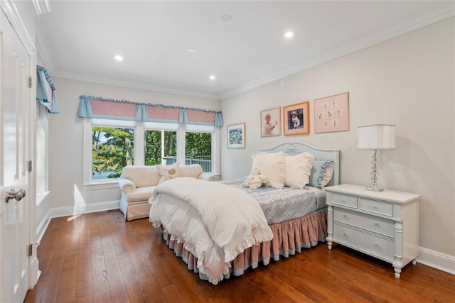 bedroom featuring dark wood-type flooring and ornamental molding