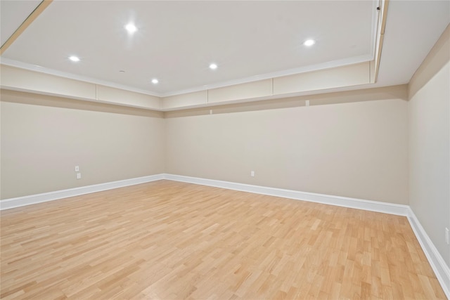 unfurnished room with light wood-type flooring