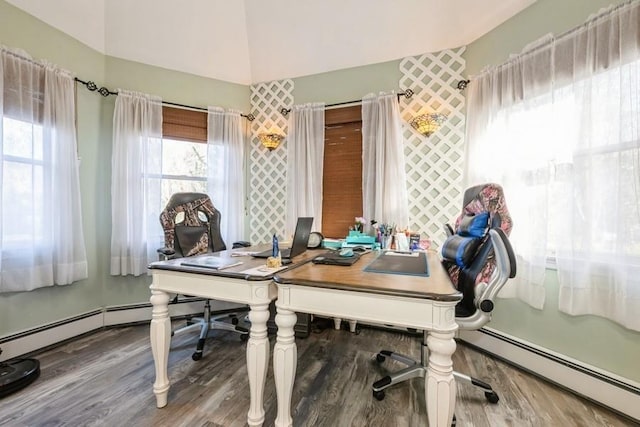 office area featuring baseboard heating and hardwood / wood-style flooring