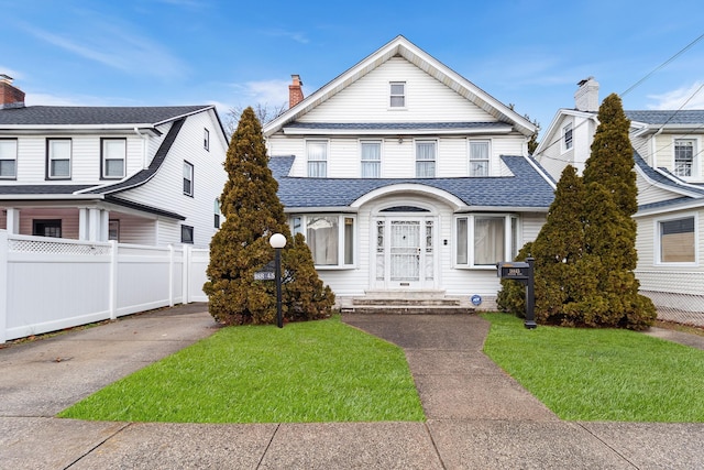 view of front of home with a front yard