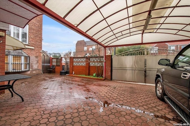 view of patio / terrace with a carport