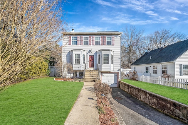 view of front facade with a front lawn