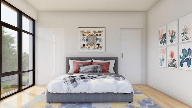 bedroom with light hardwood / wood-style floors