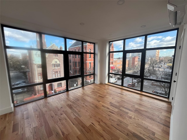 unfurnished sunroom with a healthy amount of sunlight