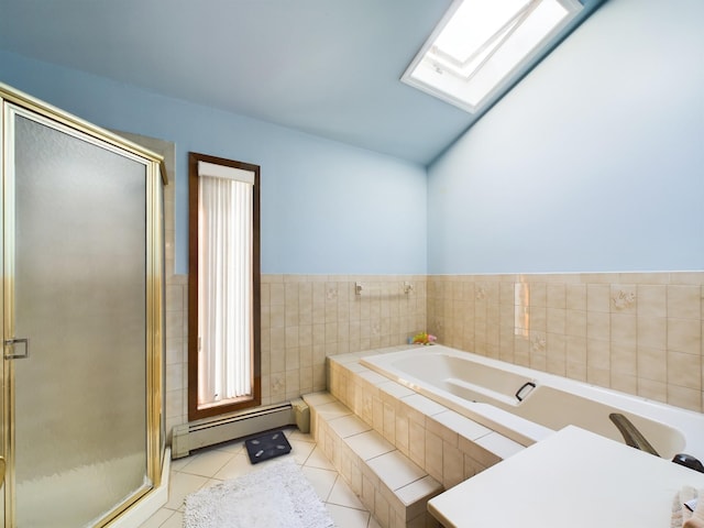 bathroom featuring tile patterned floors, a skylight, independent shower and bath, and a baseboard radiator