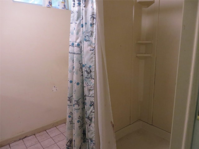 bathroom with curtained shower