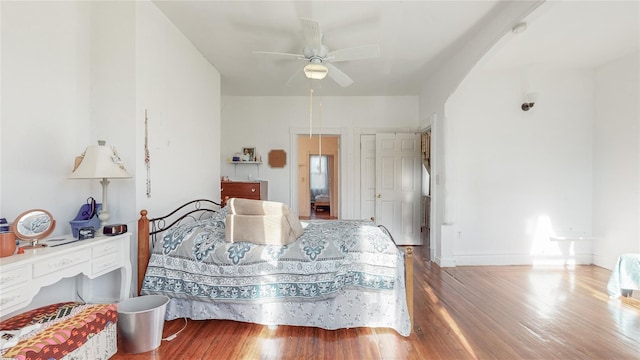 bedroom featuring ceiling fan and wood-type flooring