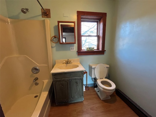 full bathroom featuring bathtub / shower combination, toilet, vanity, and hardwood / wood-style floors