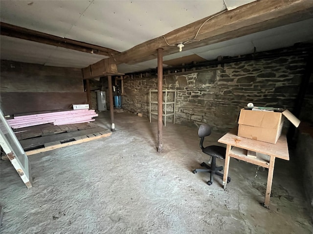 basement featuring electric water heater