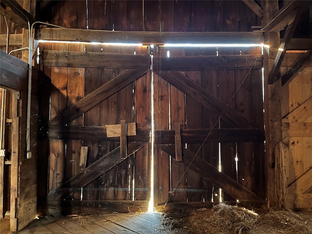 interior space featuring wooden walls