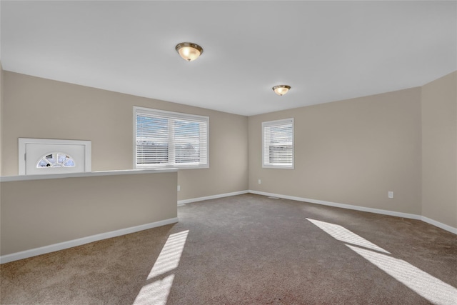 unfurnished room with carpet