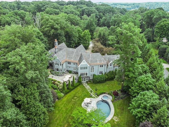 bird's eye view with a forest view