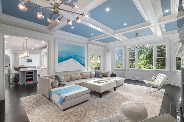 sunroom / solarium with an inviting chandelier, coffered ceiling, and beam ceiling