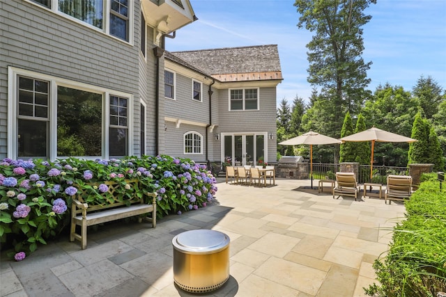 view of patio / terrace with outdoor dining area and french doors