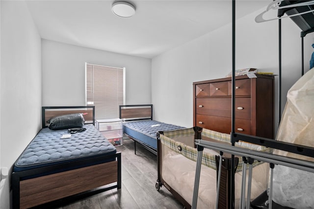 bedroom featuring hardwood / wood-style flooring