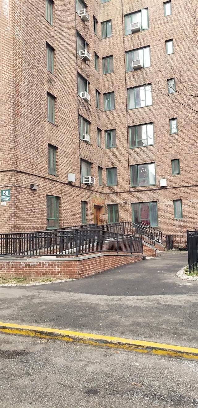 view of building exterior featuring cooling unit