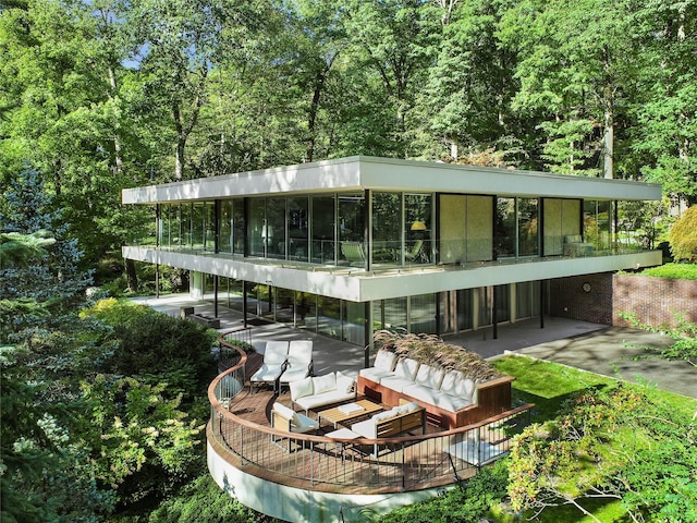 exterior space featuring an outdoor hangout area