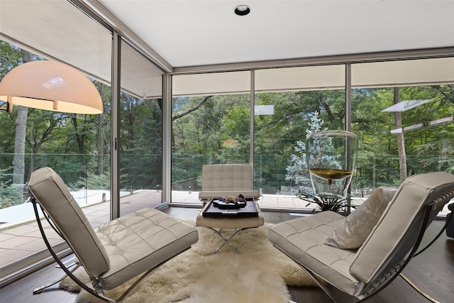 sunroom / solarium featuring a healthy amount of sunlight