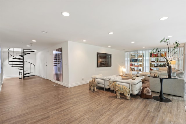 living room with hardwood / wood-style flooring