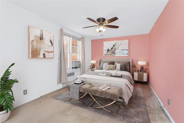 bedroom with ceiling fan and cooling unit