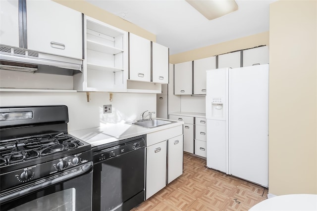 kitchen featuring white cabinetry, sink, light parquet flooring, and black appliances