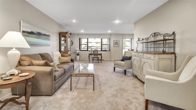 living room featuring light carpet