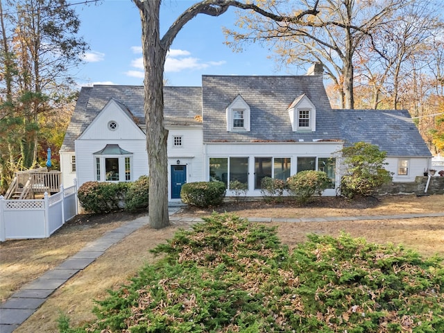 view of new england style home